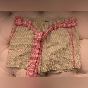 Pink and green seersucker shorts.